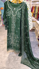 Elegant dark green embroidered lawn 3-piece suit by Fashion Street, featuring intricate embroidery and traditional design.