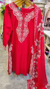 Ruby red embroidered luxury lawn suit with intricate detailing, featuring a matching dupatta and traditional design by Fashion Street.