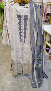 Elegant grey printed lawn 3-piece suit by Fashion Street, featuring intricate patterns and matching fabric for a sophisticated look.