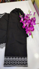 Black embroidered top set from Fashion Street, featuring intricate embroidery and stylish design, displayed on a hanger.