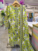 Lime green floral printed 3-piece lawn suit by Fashion Street, showing the top, dupatta, and matching bottom fabric.