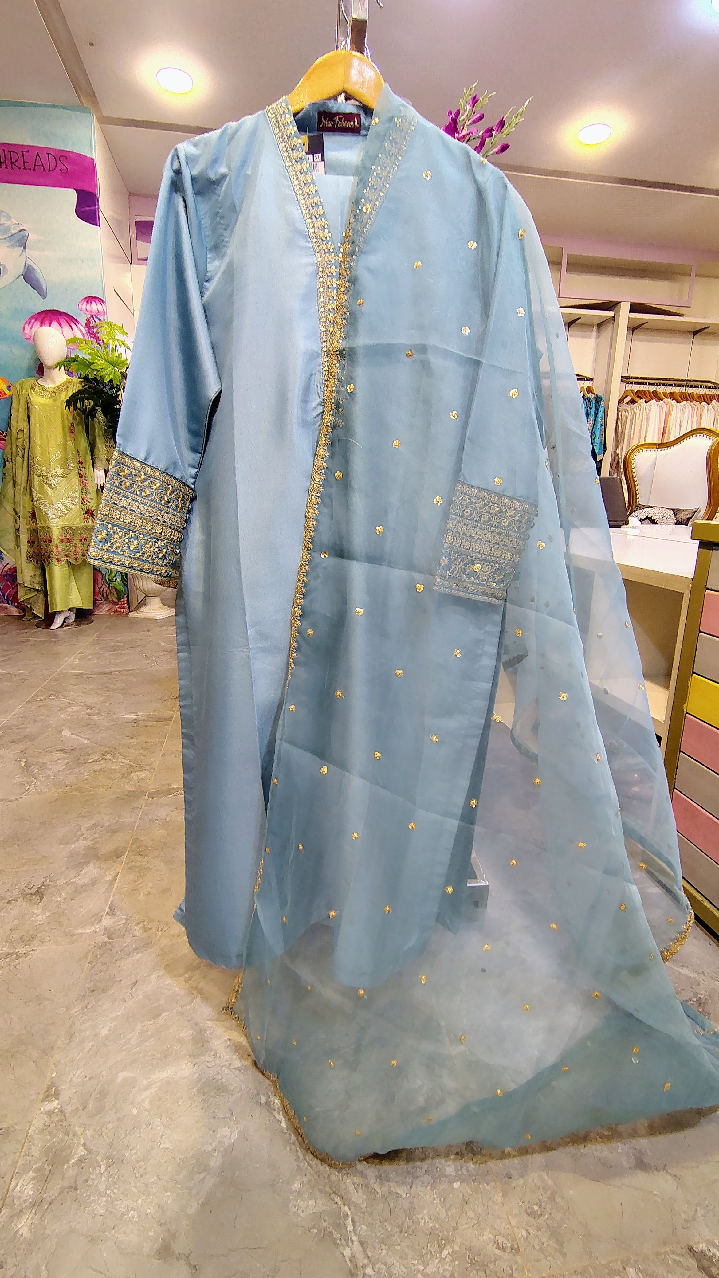 Seafoam blue fancy party wear suit by Fashion Street, featuring intricate embroidery and stylish design for festive occasions.