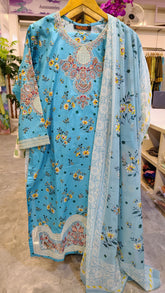 Three-piece embroidered lawn suit by Fashion Street, featuring a printed fabric, intricate embroidery, and matching dupatta.