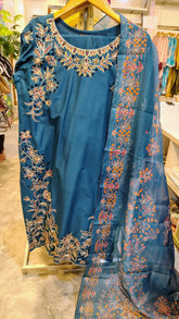 Stitched lawn suit 3-piece set from Fashion Street with intricate embroidery, displayed on a hanger against a neutral background.