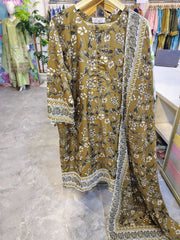 Brown printed 3-piece lawn suit by Fashion Street featuring intricate patterns, lightweight fabric, and traditional design details.