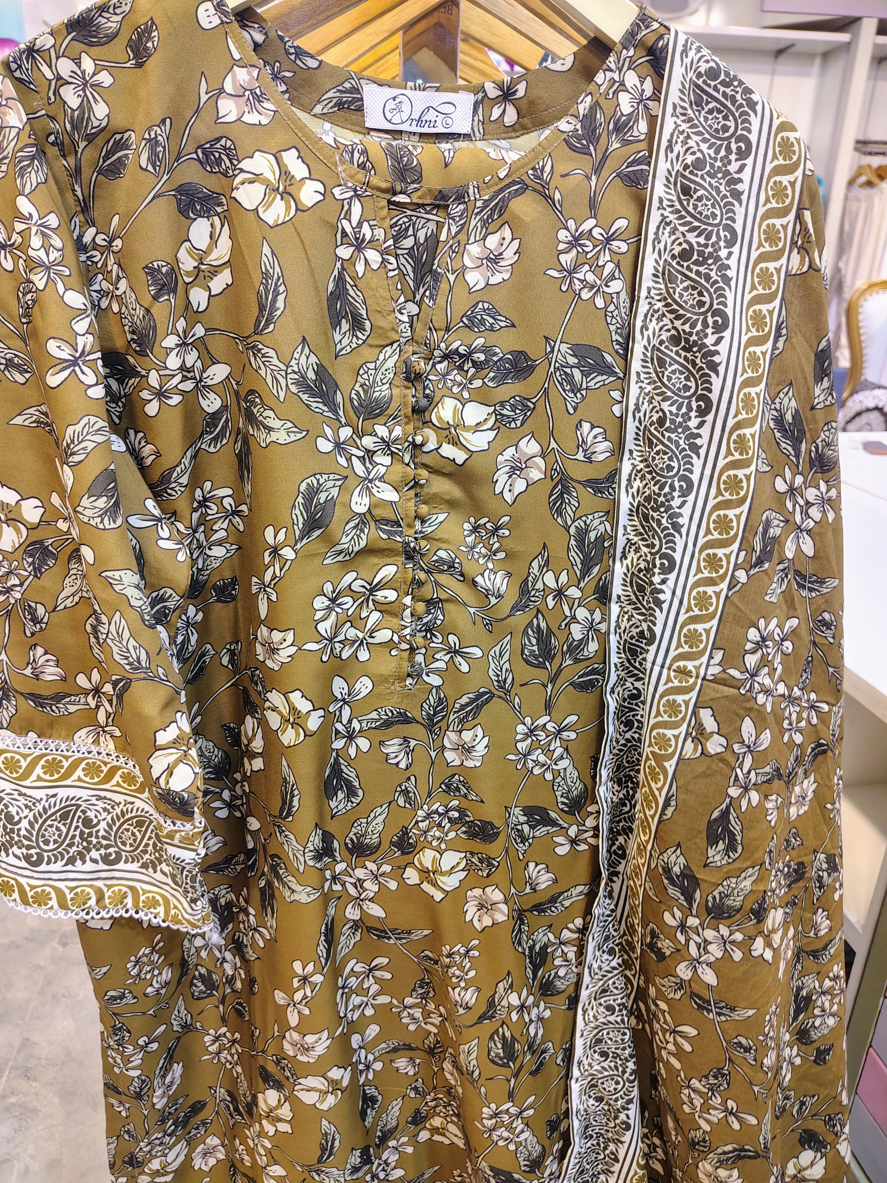 Brown printed 3-piece lawn suit by Fashion Street featuring intricate design and comfortable fabric for casual wear.