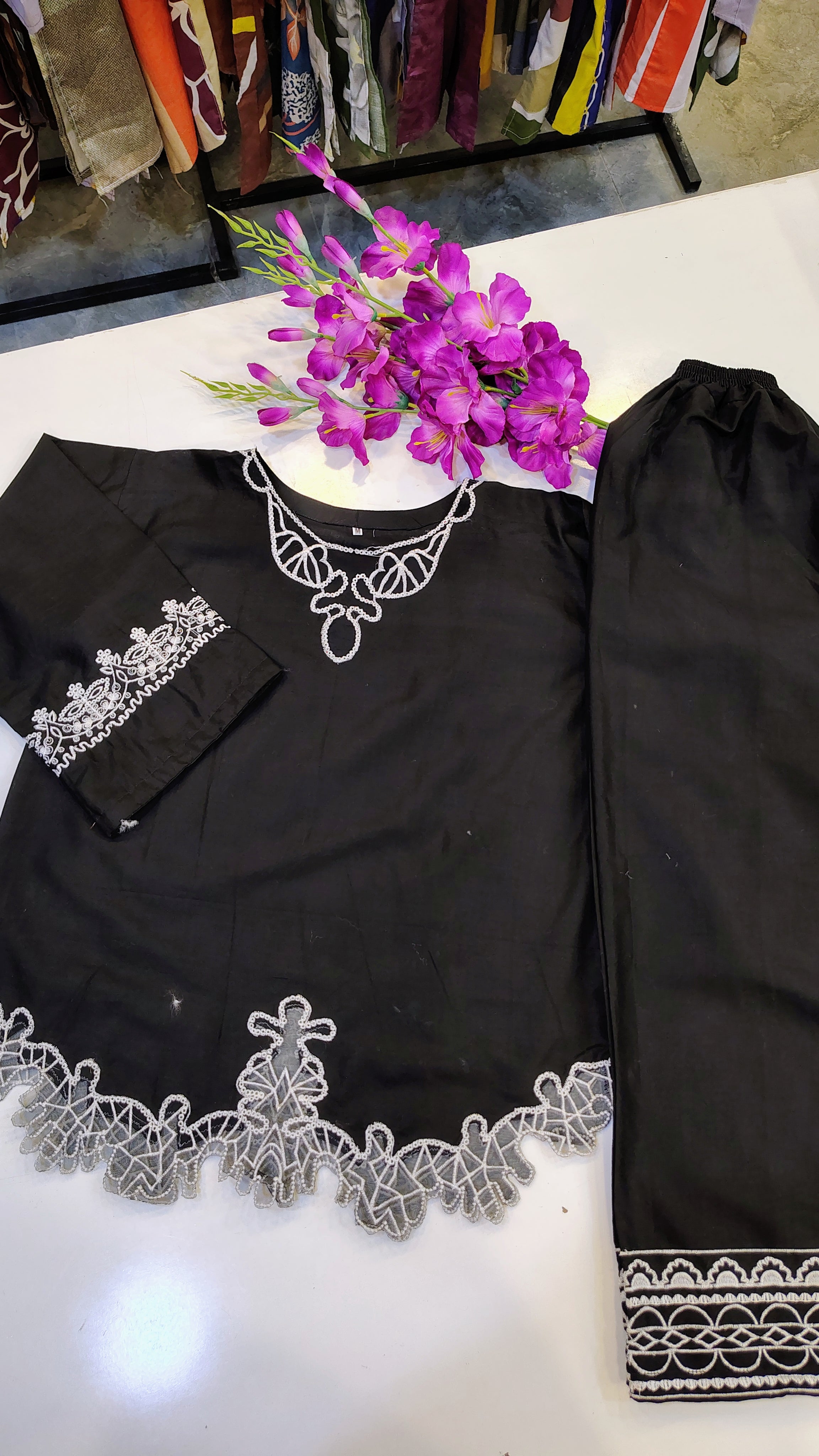 Black embroidered top set by Fashion Street, featuring intricate embroidery and stylish design, displayed on a mannequin.