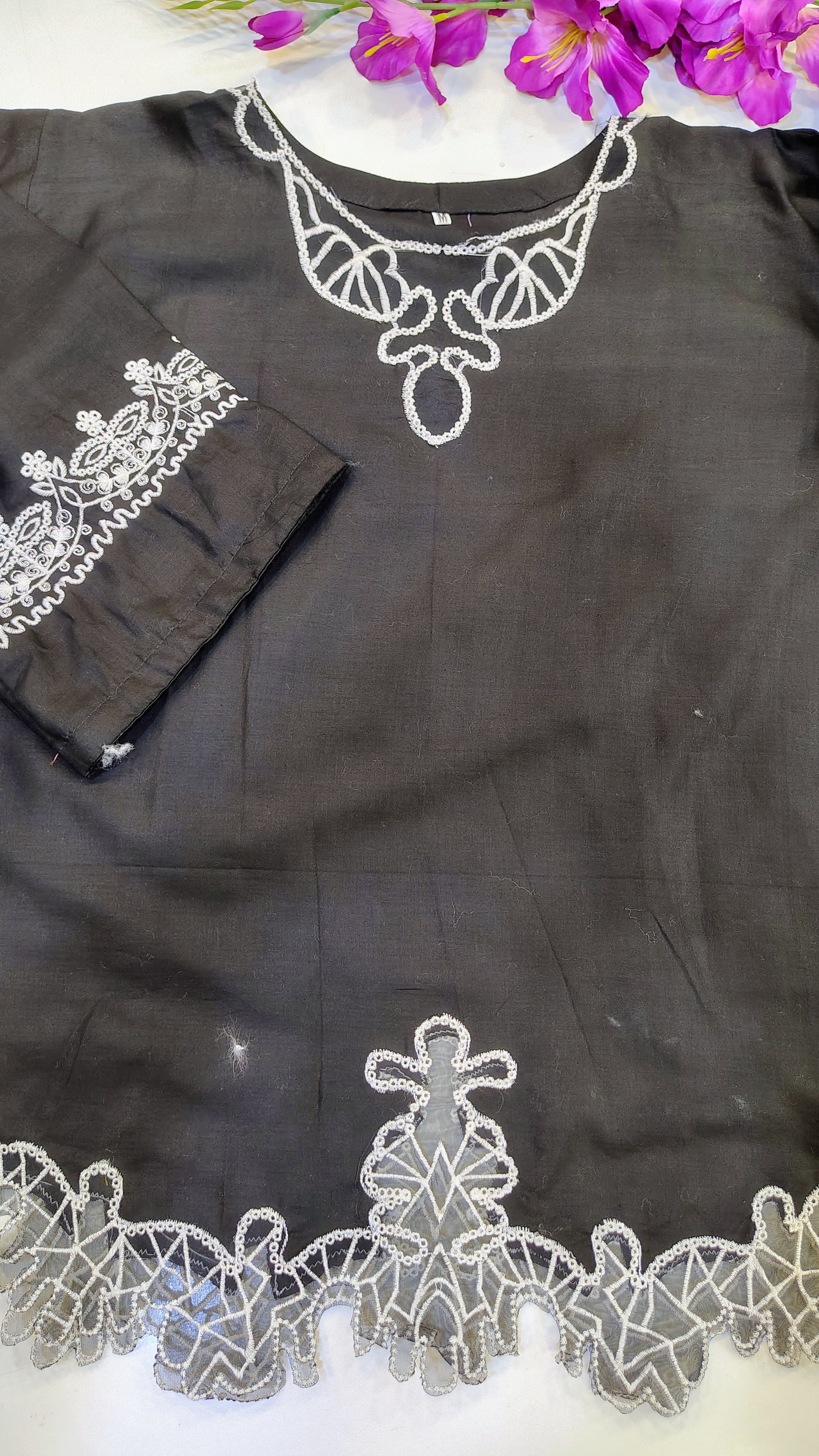 Black embroidered top set by Fashion Street, featuring intricate embroidery and stylish design, shown on a model.