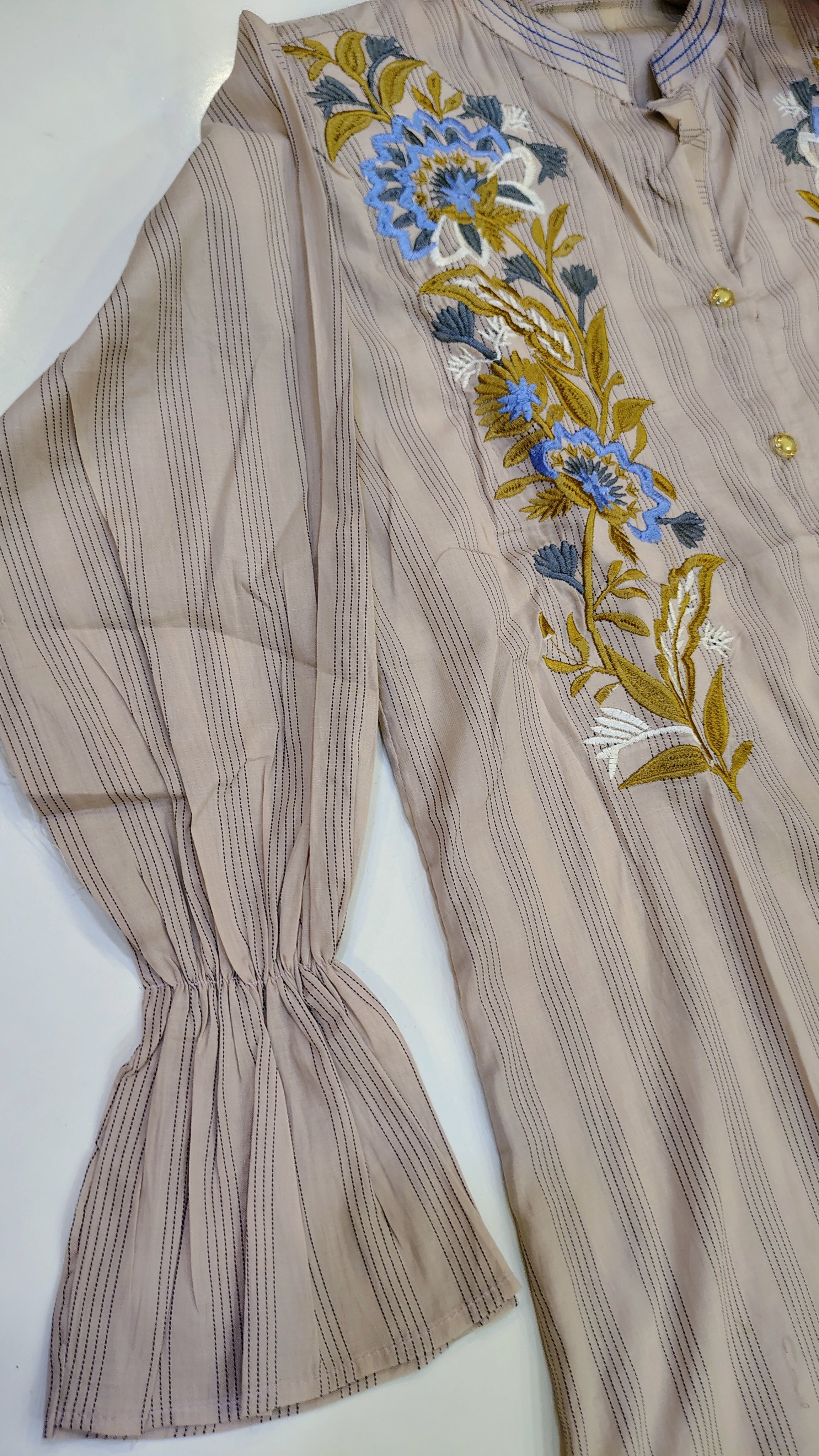 Elegant short-length lawn kurta by Fashion Street featuring intricate embroidery and vibrant fabric, perfect for summer wear.