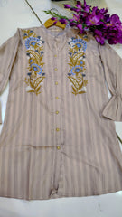 Elegant short-length lawn kurta from Fashion Street featuring intricate embroidery and vibrant colors, perfect for summer wear.