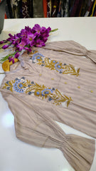 Elegant short-length lawn kurta by Fashion Street featuring intricate embroidery and vibrant fabric for stylish traditional wear.