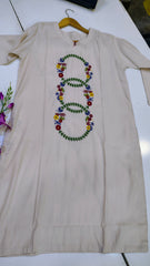 Off-White long embroidered lawn kurta with intricate floral embroidery and traditional design, perfect for elegant casual wear.