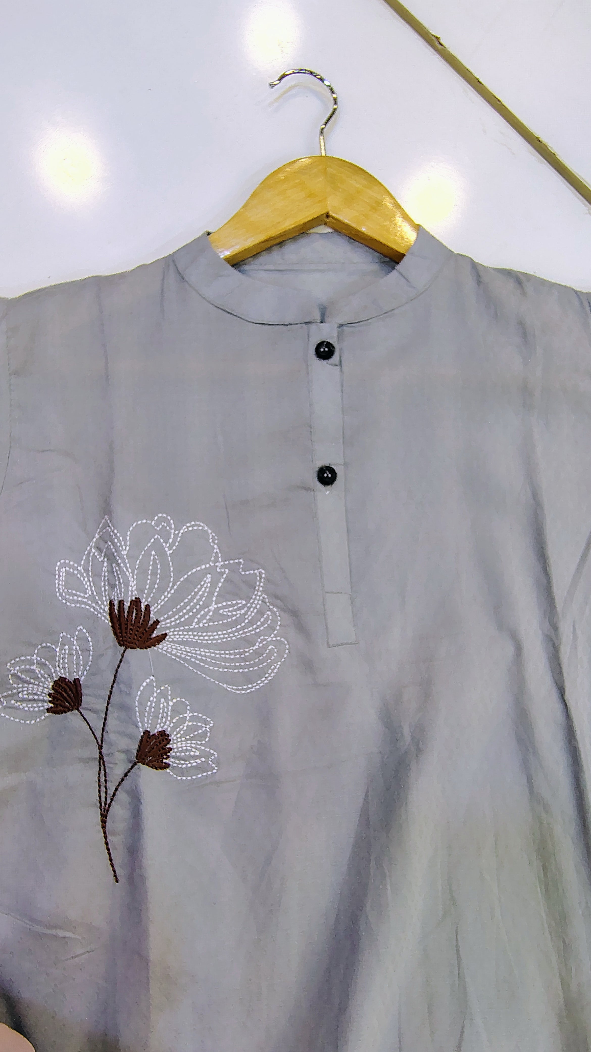 Short length embroidered lawn kurta by Fashion Street, featuring intricate embroidery and lightweight fabric for casual wear.