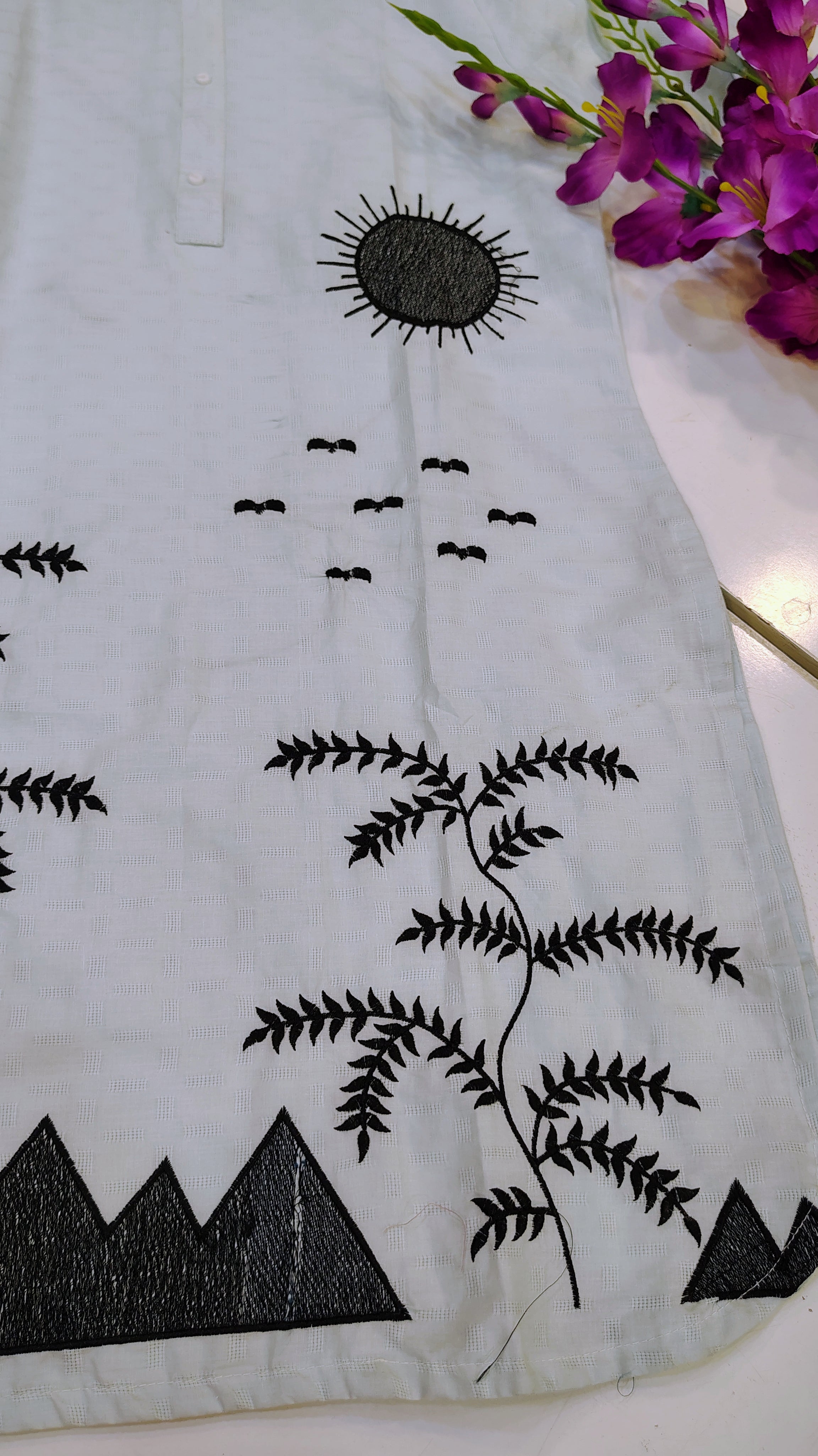 Elegant white embroidered lawn kurta with intricate detailing, perfect for traditional or casual wear by Fashion Street.