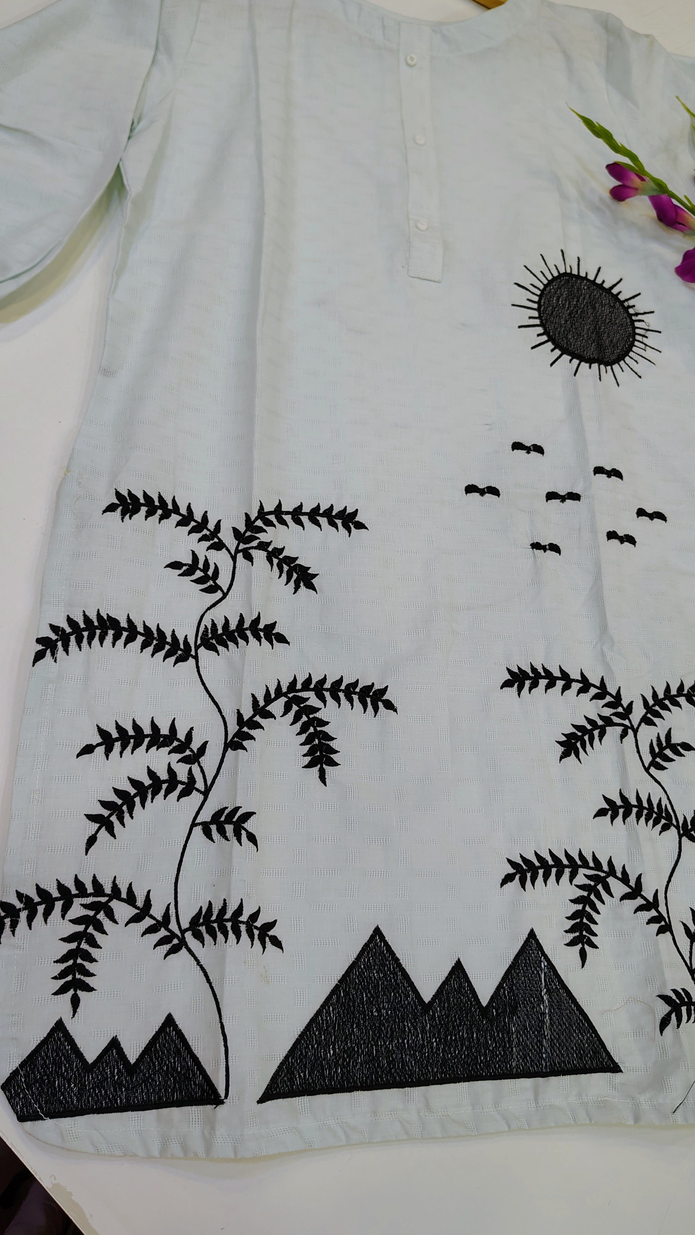 Elegant white embroidered lawn kurta with intricate detailing, featuring a stylish and comfortable design by Fashion Street.
