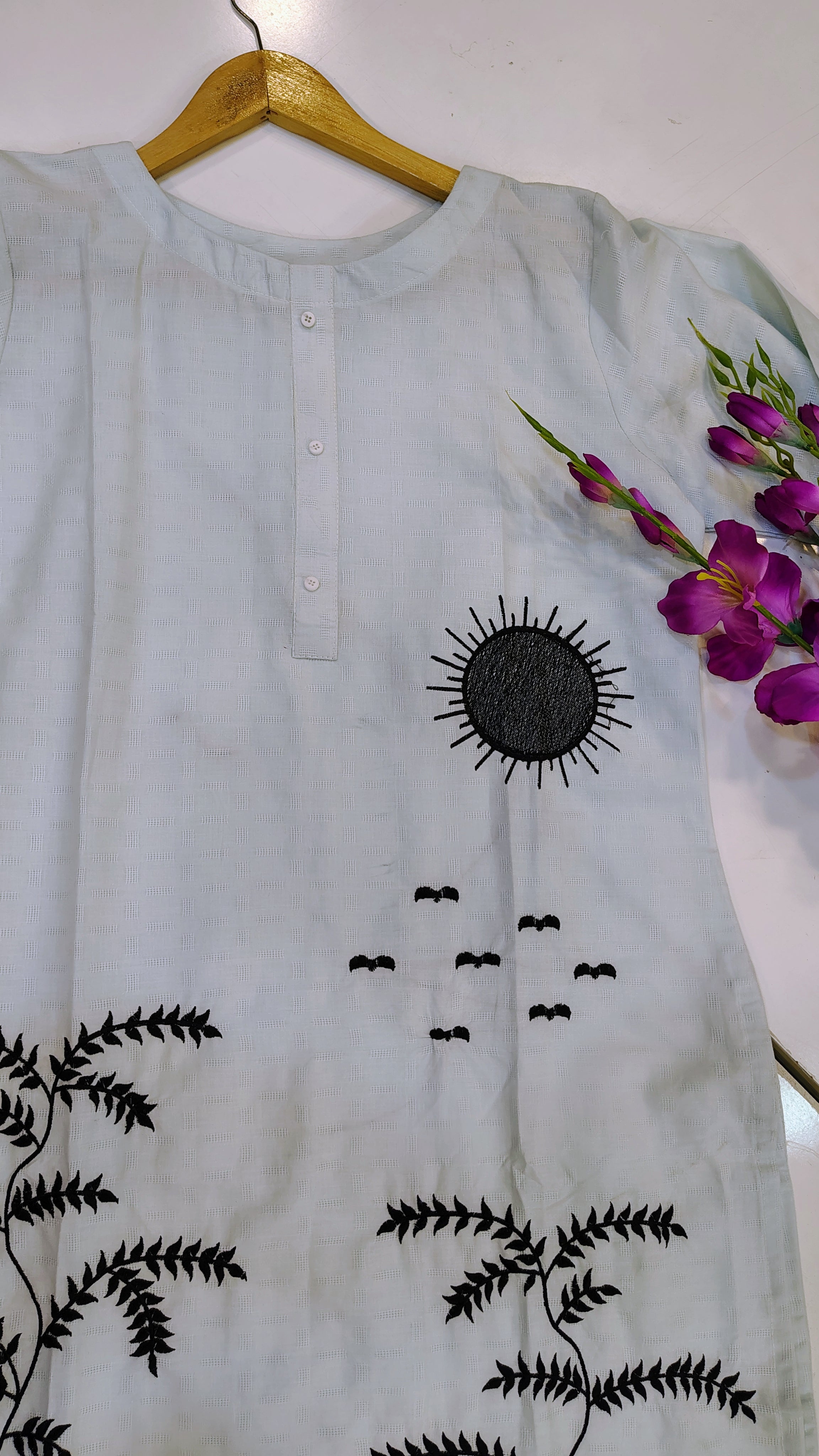 Elegant white embroidered lawn kurta with intricate detailing, perfect for traditional and casual wear by Fashion Street.