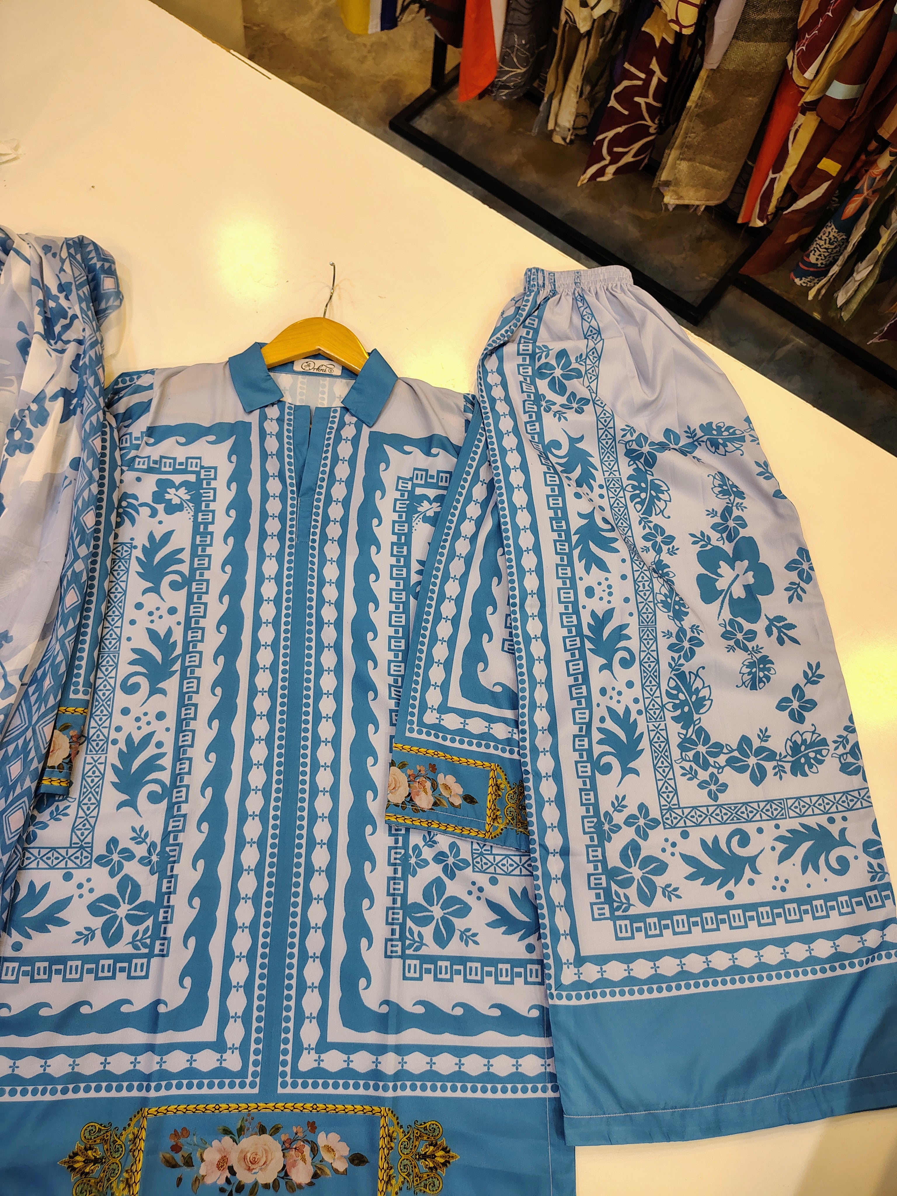 Sky blue printed 3-piece co-ord set from Fashion Street featuring a matching top, pants, and jacket on a model.