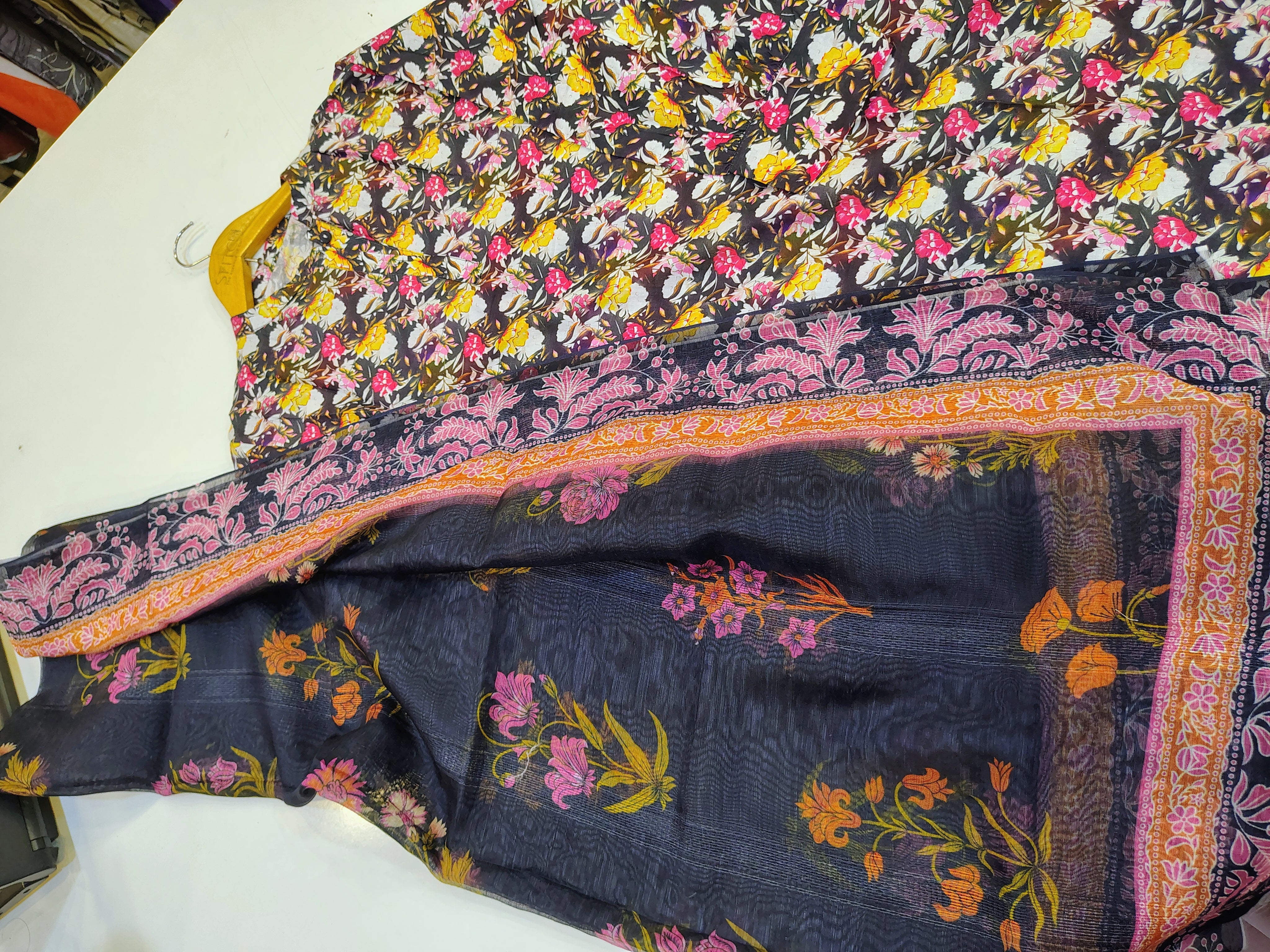 Elegant floral printed 3-piece lawn suit with farshi shalwar by Fashion Street, featuring intricate embroidery and vibrant colors.
