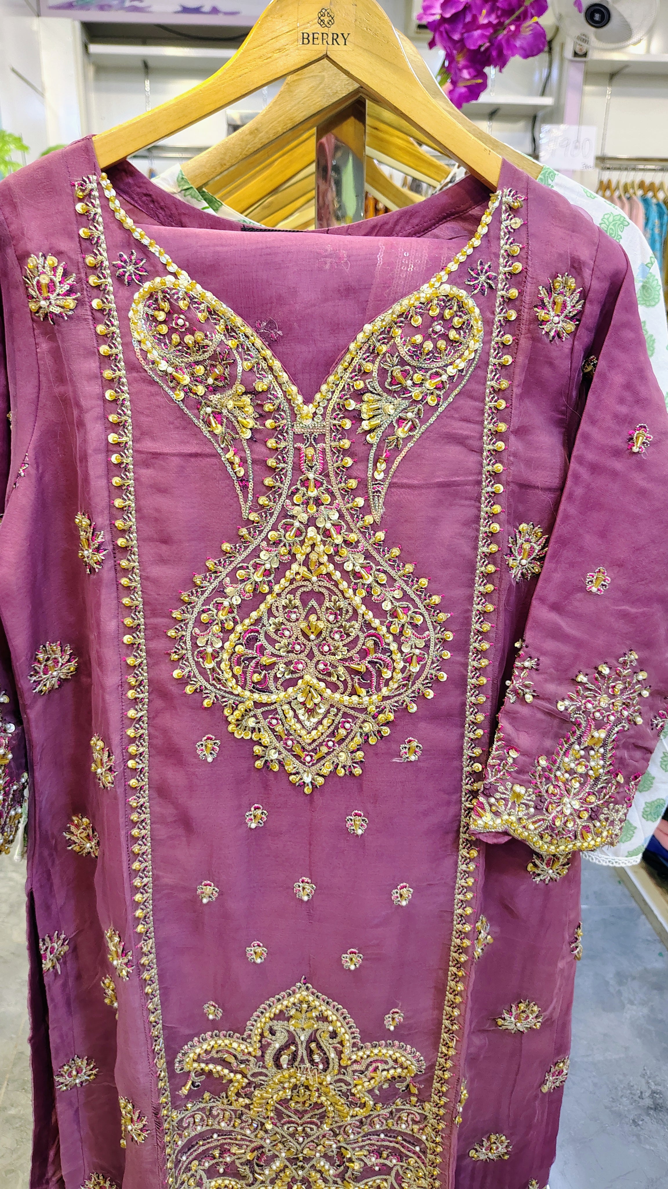 Luxury plum party wear suit by Fashion Street featuring intricate embroidery and elegant fabric for festive occasions.