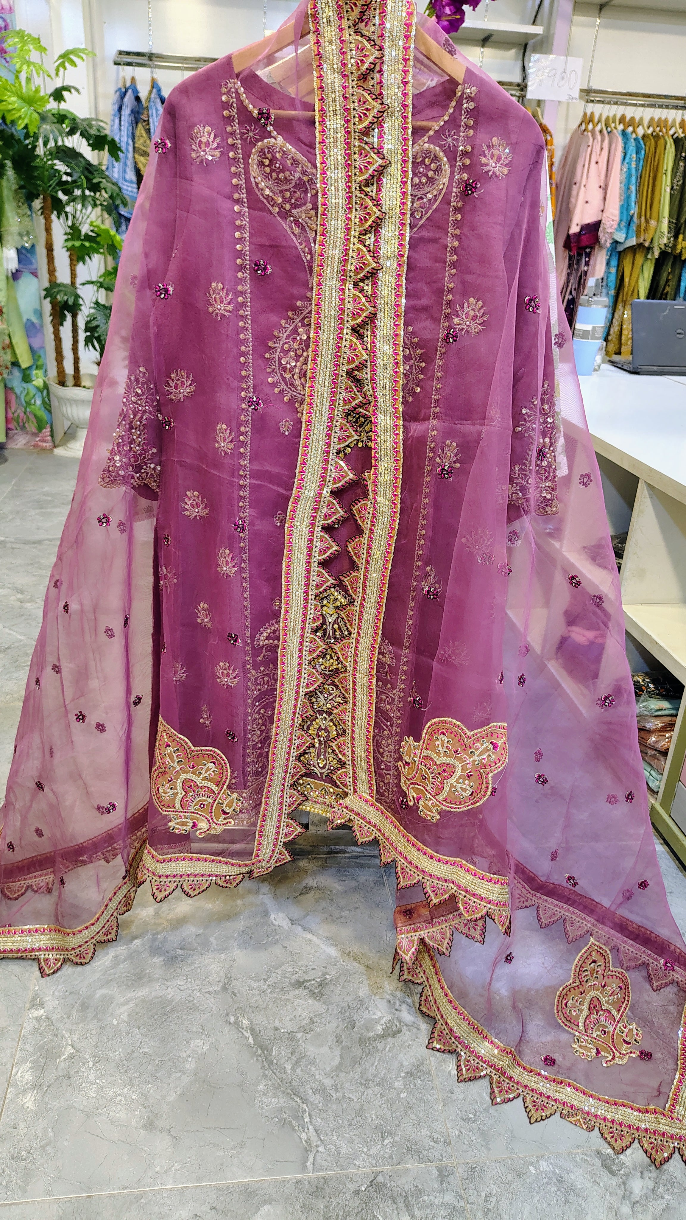 Luxury plum party wear suit by Fashion Street featuring elegant fabric and intricate design, perfect for special occasions.