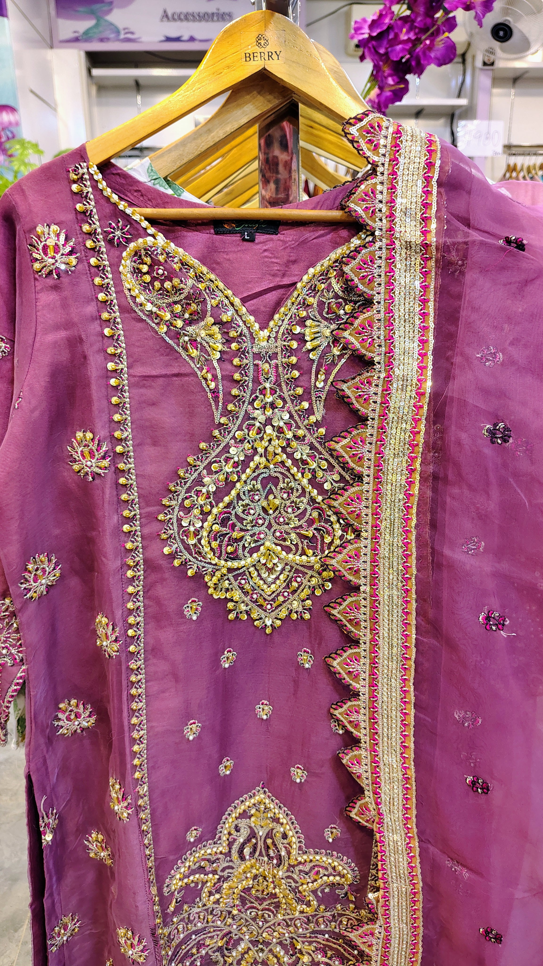 Elegant luxury plum party wear suit by Fashion Street, featuring intricate embroidery and stylish fabric for special occasions.