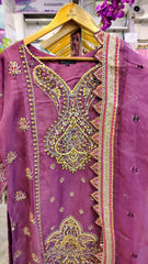 Elegant luxury plum party wear suit by Fashion Street, featuring intricate embroidery and stylish fabric for special occasions.