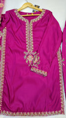 Elegant embroidered party wear suit by Fashion Street, featuring intricate designs and luxurious fabric for special occasions.